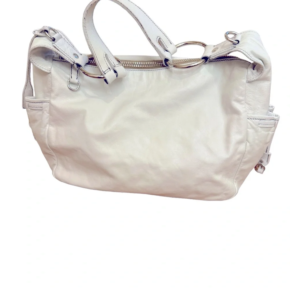 Vintage Miu Miu white leather hobo bag in excellent used condition.